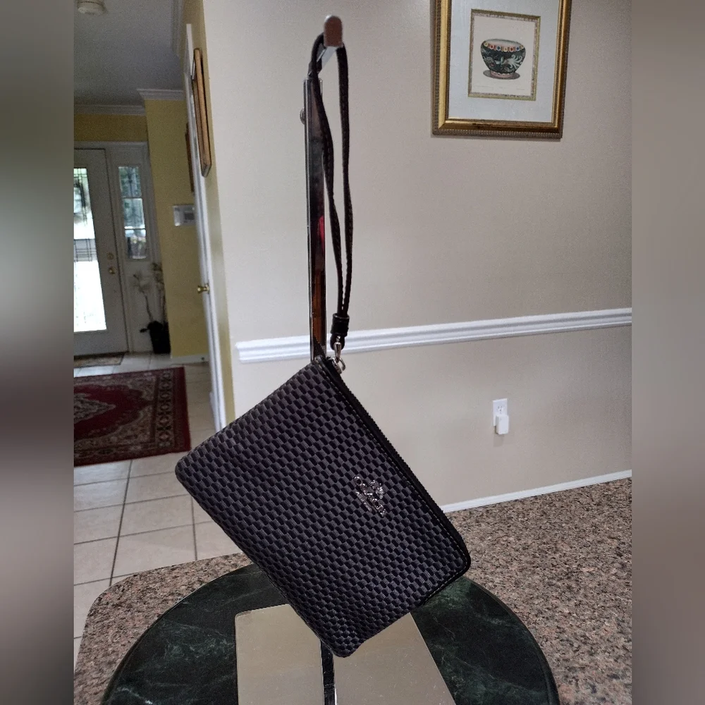Black and gray checkered Coach Wristlet